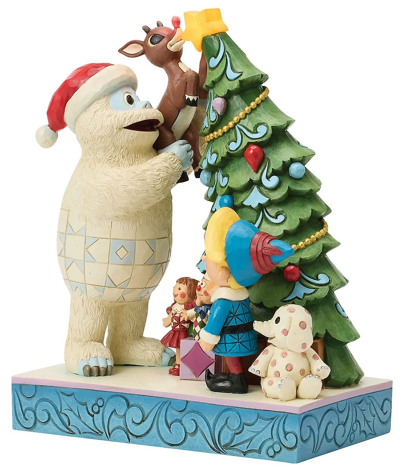 Jim Shore Rudolph Traditions Battery-Operated Light-Up Bumble Holding Rudolph by Tree Figurine
