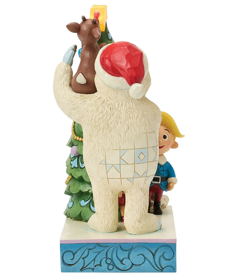 Jim Shore Rudolph Traditions Battery-Operated Light-Up Bumble Holding Rudolph by Tree Figurine