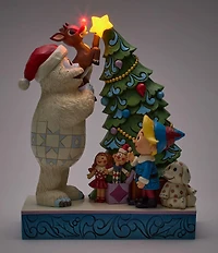 Jim Shore Rudolph Traditions Battery-Operated Light-Up Bumble Holding Rudolph by Tree Figurine