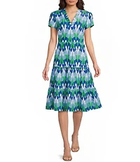 Jude Connally Libby Paradise Ikat Print Jude Cloth Stretch Knit V-Neck Short Puff Sleeve A-Line Tiered Midi Dress