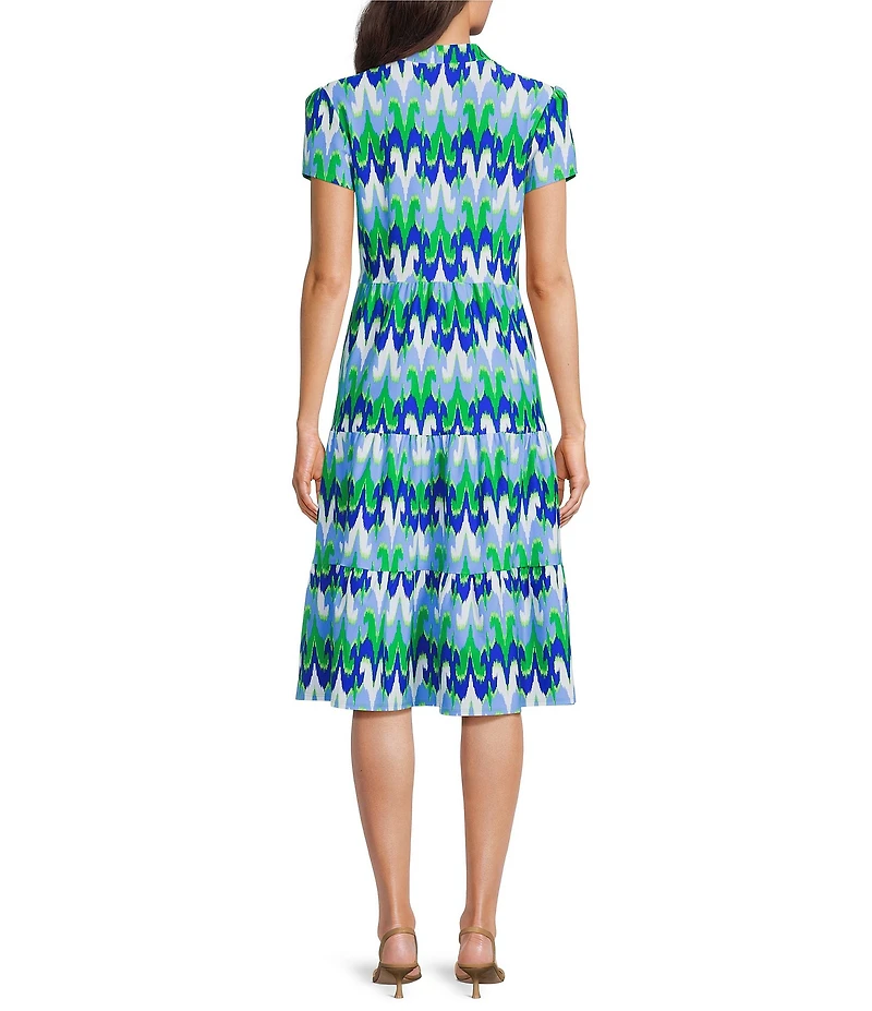 Jude Connally Libby Paradise Ikat Print Jude Cloth Stretch Knit V-Neck Short Puff Sleeve A-Line Tiered Midi Dress