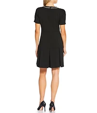KARL LAGERFELD PARIS Scuba Crepe Short Sleeve Metallic Fringe Piping Pleated Skirt A-Line Dress