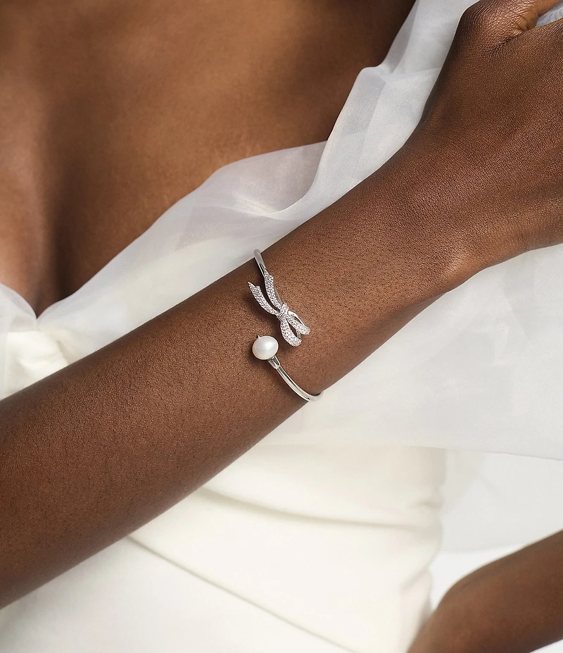 Nadri Eros Flex Bow And Pearl Cuff Bracelet