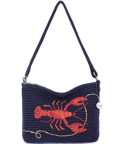 The Sak Lumi Crochet Lobster Crossbody Bag
