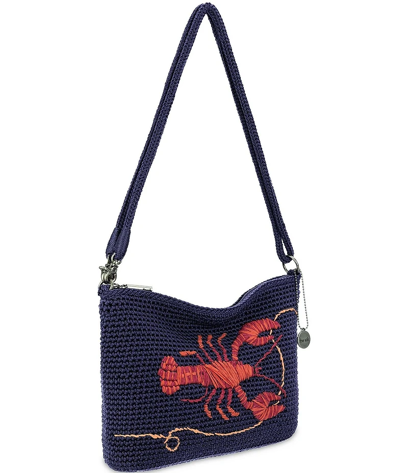 The Sak Lumi Crochet Lobster Crossbody Bag