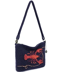 The Sak Lumi Crochet Lobster Crossbody Bag
