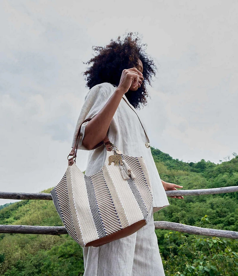 The Sak Roma Woven Straw Expandable Shoulder Bag