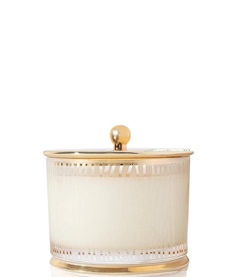 Thymes Frasier Fir Gilded Frosted Wood Grain Candle. 9oz.