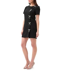 Trina Turk Diamonds Crew Neck Short Sleeve Embellished Bow Front Mini Dress