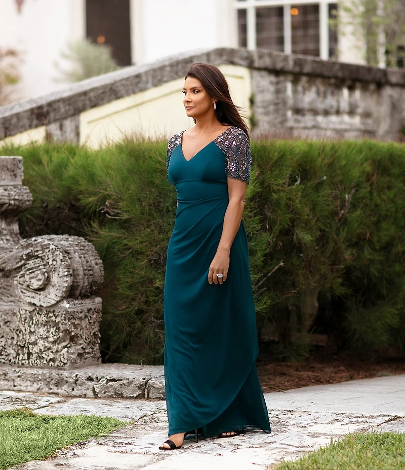 Xscape Short Beaded Sheer Flutter Sleeve Cascading Draped Waist V-Neck Beaded Gown