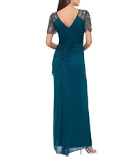 Xscape Short Beaded Sheer Flutter Sleeve Cascading Draped Waist V-Neck Beaded Gown