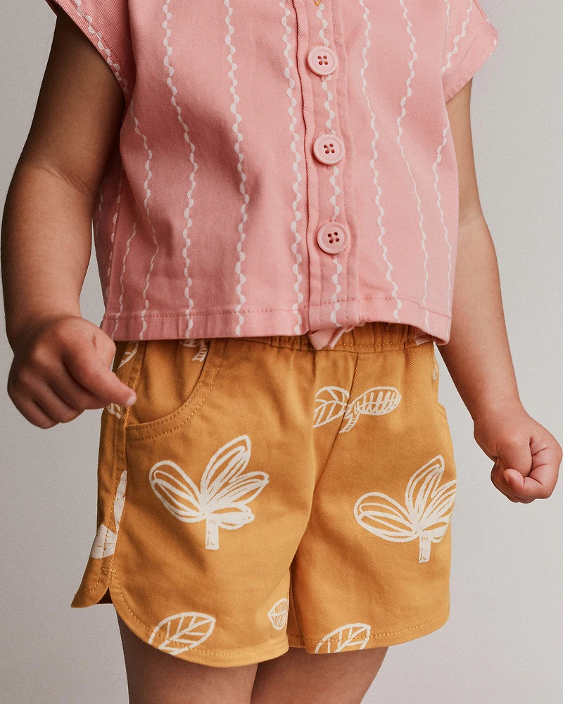 Toddler Girl Dolphin Hem Short in Plant Print - Golden Yellow