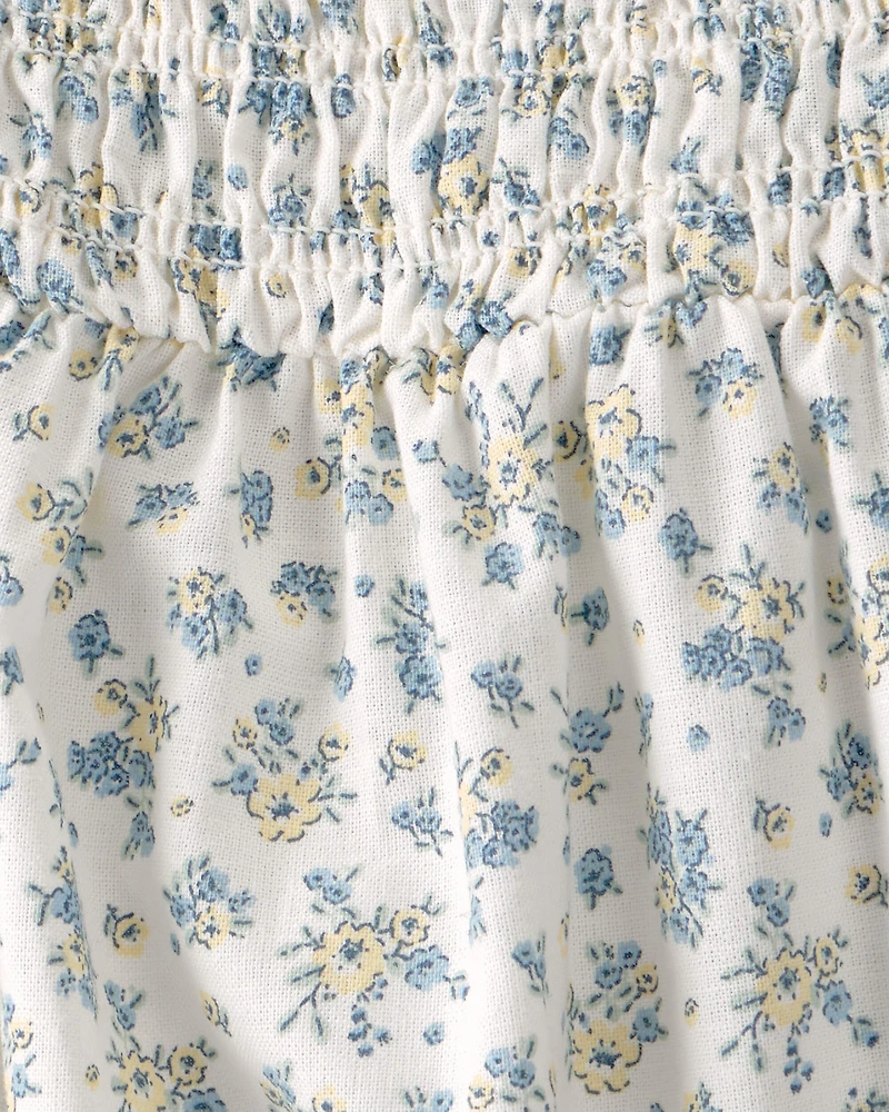 Baby Girl Smocked Romper Made with Organic Cotton in Spring Bloom