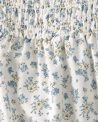 Baby Girl Smocked Romper Made with Organic Cotton in Spring Bloom