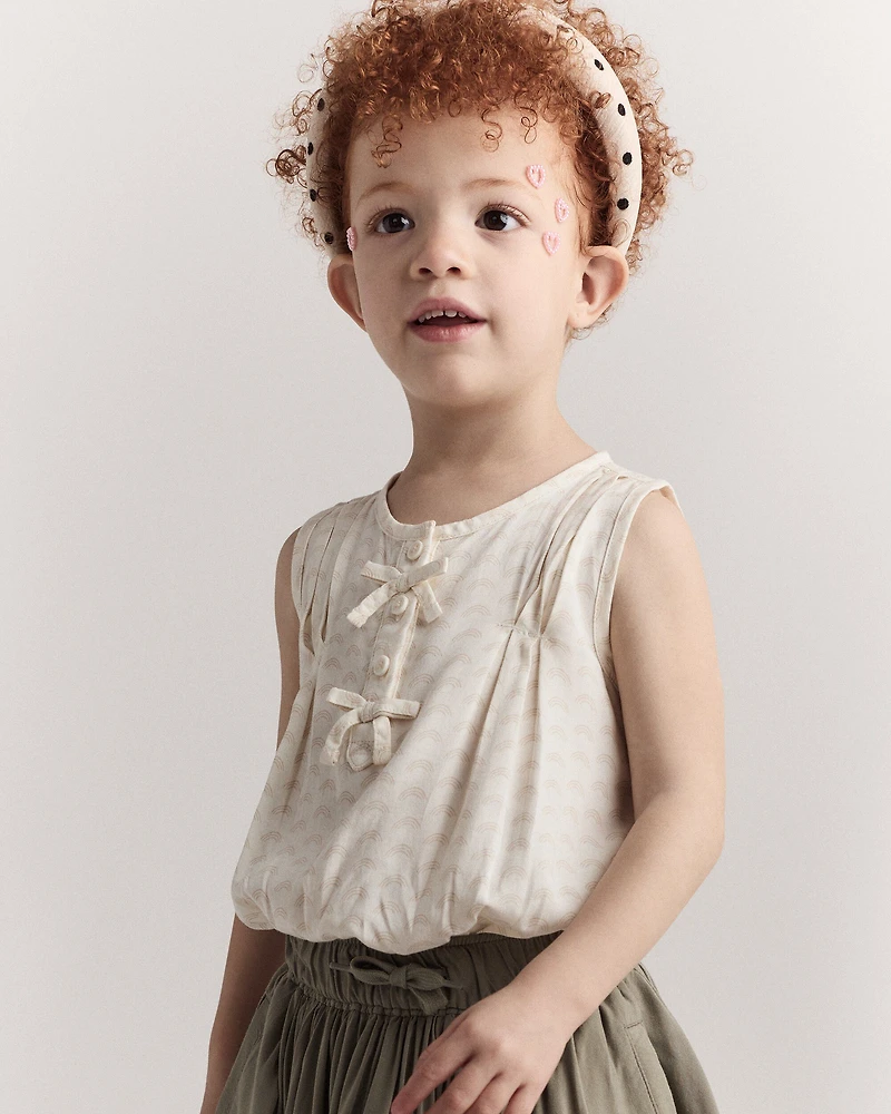 Toddler Girl Sleeveless Bow Top in Rainbow Print - Cream