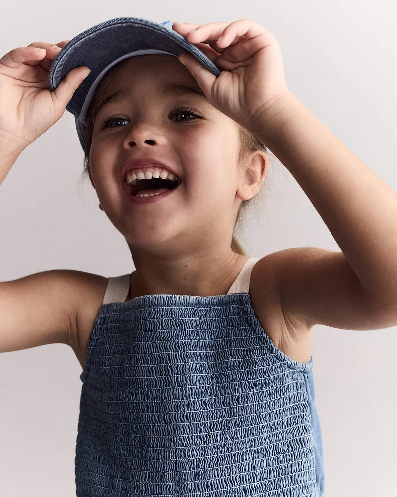 Toddler Girl Smocked Peplum Top in Chambray