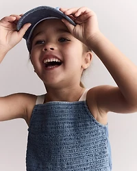 Toddler Girl Smocked Peplum Top in Chambray