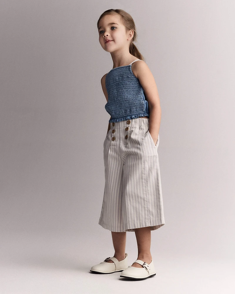 Toddler Girl Smocked Peplum Top in Chambray