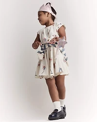 Toddler Girl Avenue Twirl™ Dress in Park Day Print - Cream
