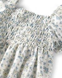 Baby Girl Smocked Romper Made with Organic Cotton in Spring Bloom