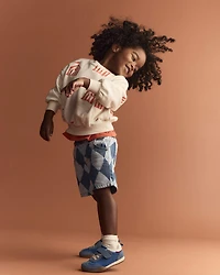 Toddler Otter Sweatshirt™ with Pockets in Big Top Print - Cream