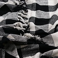 white plaid woven cotton throw blanket