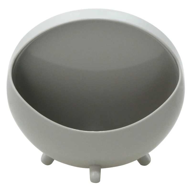 round navy vanity mirror with makeup brush storage