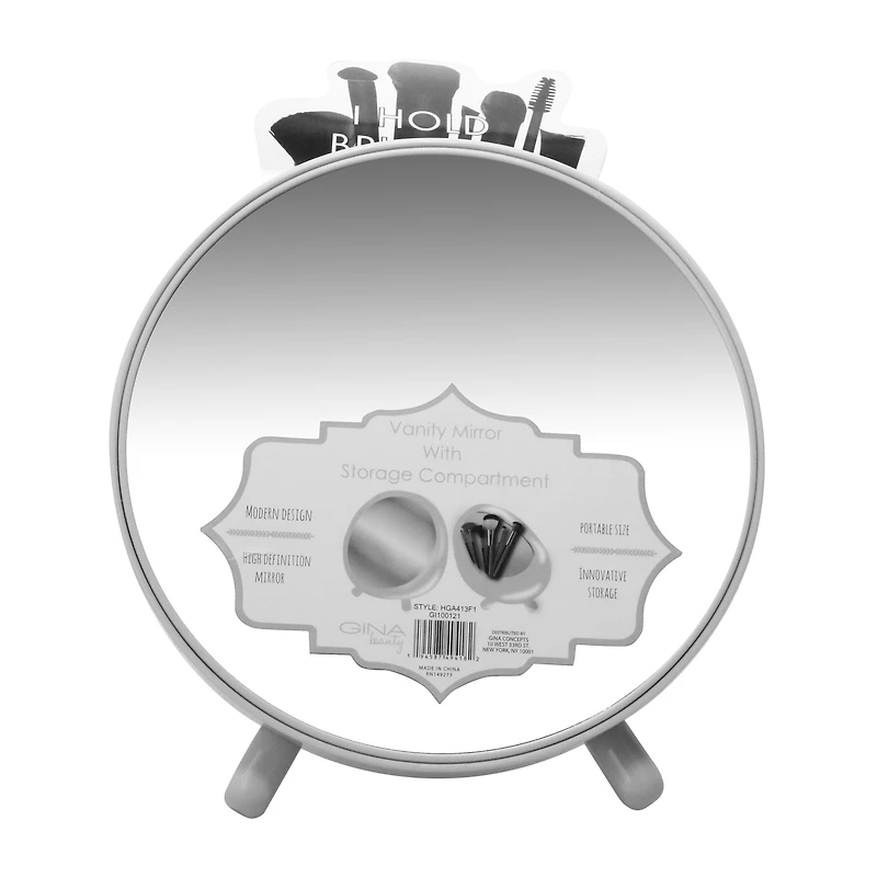 round navy vanity mirror with makeup brush storage