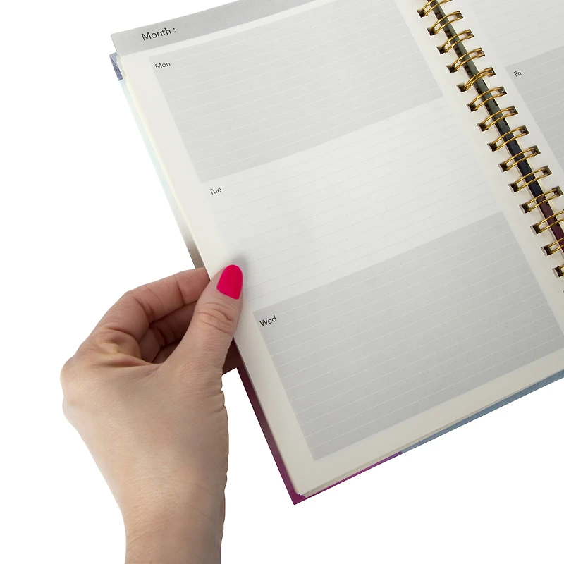spiral-bound undated weekly planner