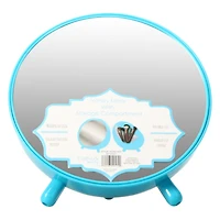 round navy vanity mirror with makeup brush storage