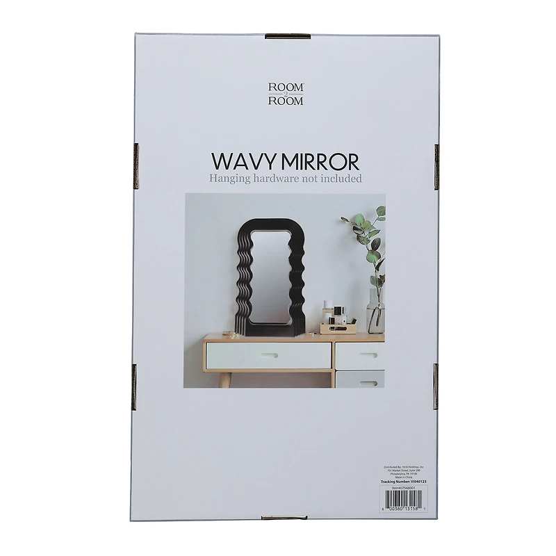 wavy wall mirror 10in x 16in