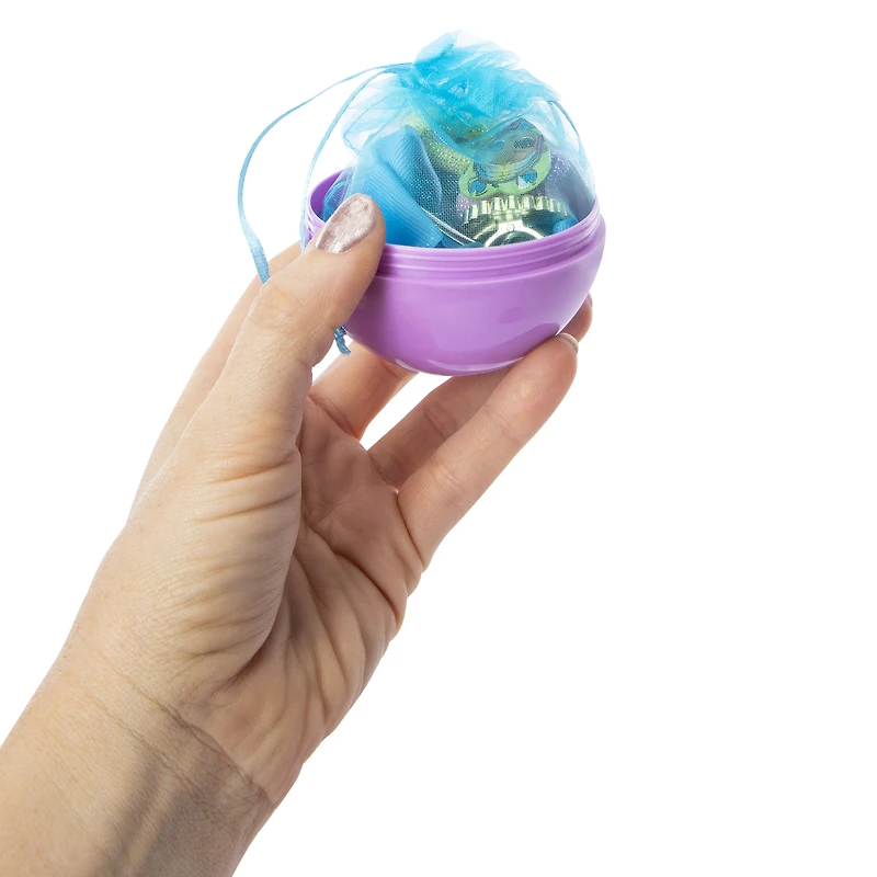 give yourself a doll-ightful makeover with this l.o.l. surprise! accessories blind bag ball. mystery accessories await you inside!
