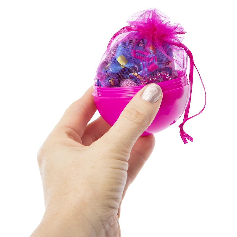 give yourself a doll-ightful makeover with this l.o.l. surprise! accessories blind bag ball. mystery accessories await you inside!