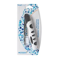 travel guard™ folding toothbrush