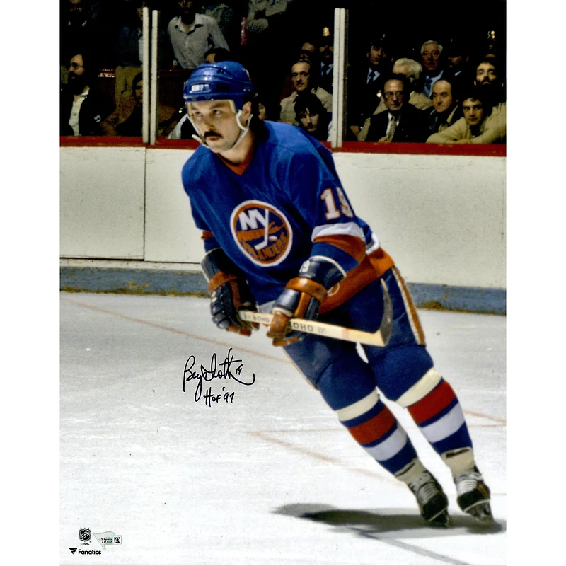 Bryan Trottier New York Islanders Autographed 16" x 20" Blue Jersey Skating Photograph with "HOF 97" Inscription