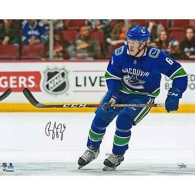 Brock Boeser Vancouver Canucks Autographed 16" x 20" Blue Jersey Skating Photograph