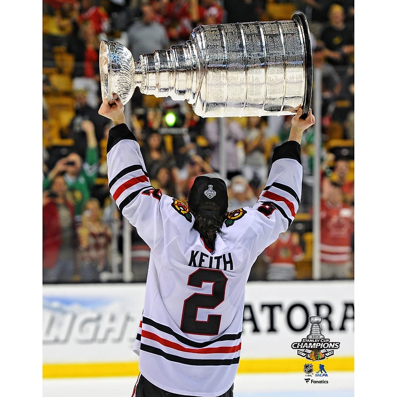 Duncan Keith Chicago Blackhawks Unsigned 2013 Stanley Cup Champions Raising Cup Photograph