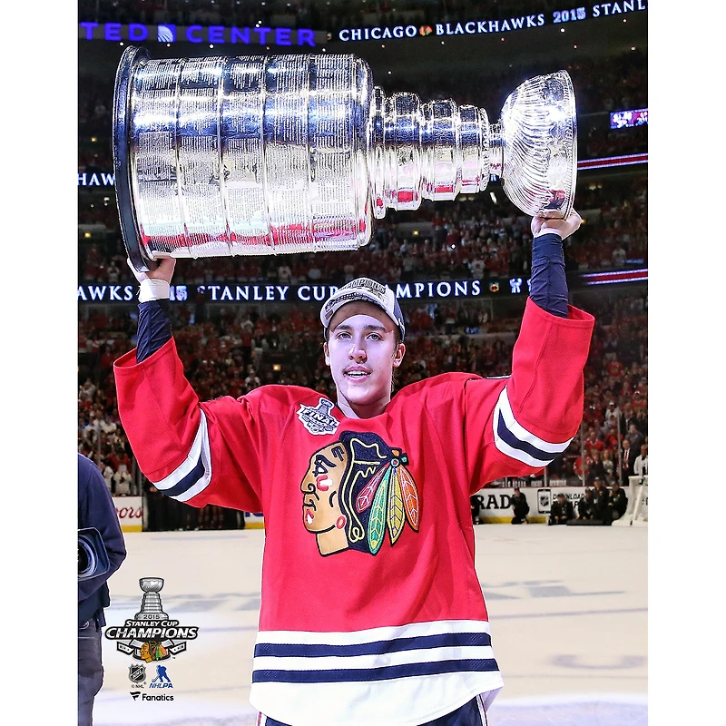 Teuvo Teravainen Chicago Blackhawks Unsigned 2015 Stanley Cup Champions Raising Cup Photograph