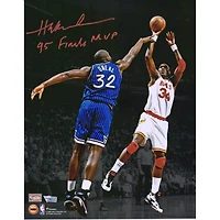 Hakeem Olajuwon Houston Rockets Autographed 11" x 14" Spotlight Shot Over Shaquille O'Neal Photograph with "95 Finals MVP" Inscription