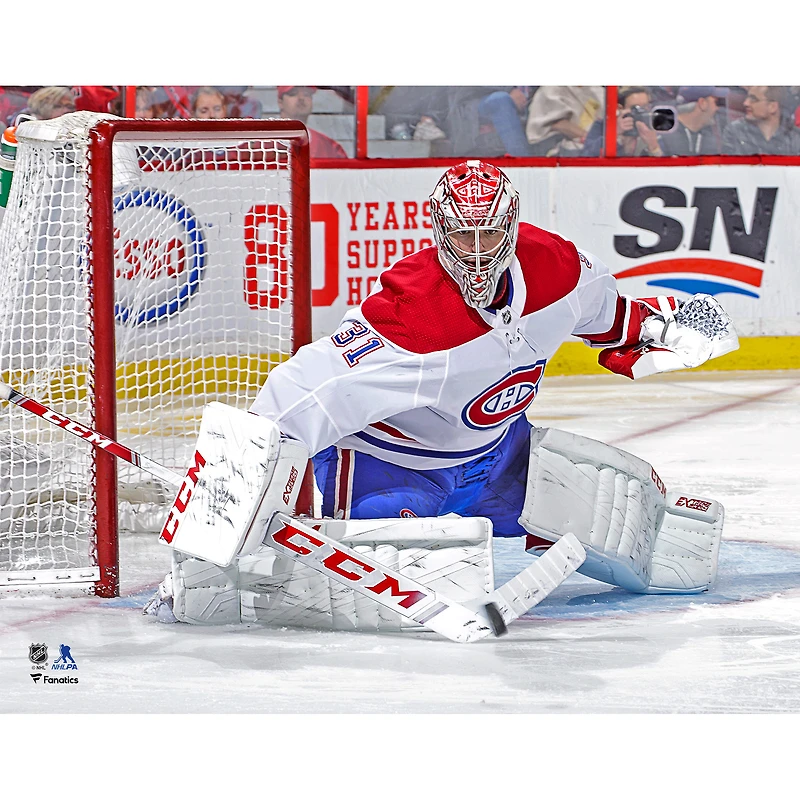 Carey Price Montreal Canadiens Unsigned White Jersey Stick Save Photograph