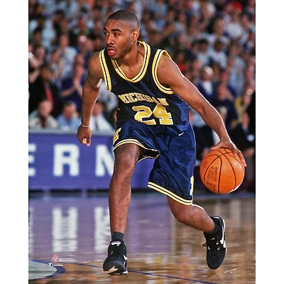 Jimmy King Michigan Wolverines Unsigned Navy Jersey Dribbling Photograph