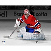 Carey Price Montreal Canadiens Unsigned Red Jersey Making Save Spotlight Photograph