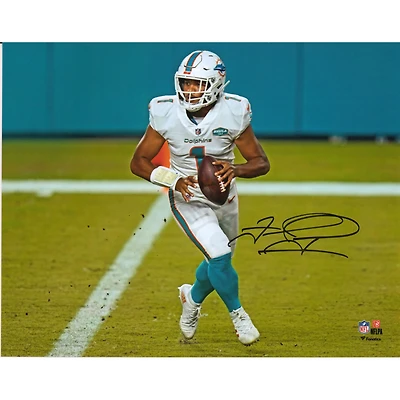 Tua Tagovailoa Miami Dolphins Autographed 8" x 10" White Jersey Rolling Out Photograph