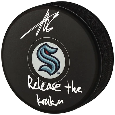 Adam Larsson Seattle Kraken Autographed Hockey Puck with "Release The Kraken" Inscription