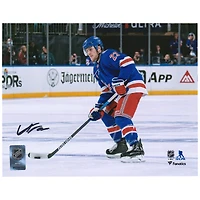 Adam Fox New York Rangers Autographed 8'' x 10'' Blue Jersey with Puck Photograph