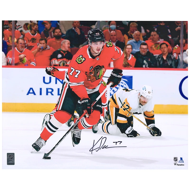 Kirby Dach Chicago Blackhawks Autographed 16" x 20" Red Jersey with Puck Photograph