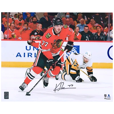 Kirby Dach Chicago Blackhawks Autographed 16" x 20" Red Jersey with Puck Photograph