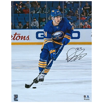 Dylan Cozens Buffalo Sabres Autographed 16" x 20" Blue Jersey Skating with Puck Photograph
