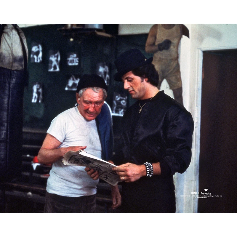 Rocky II Unsigned Rocky Looking at Paper with Mickey Photograph