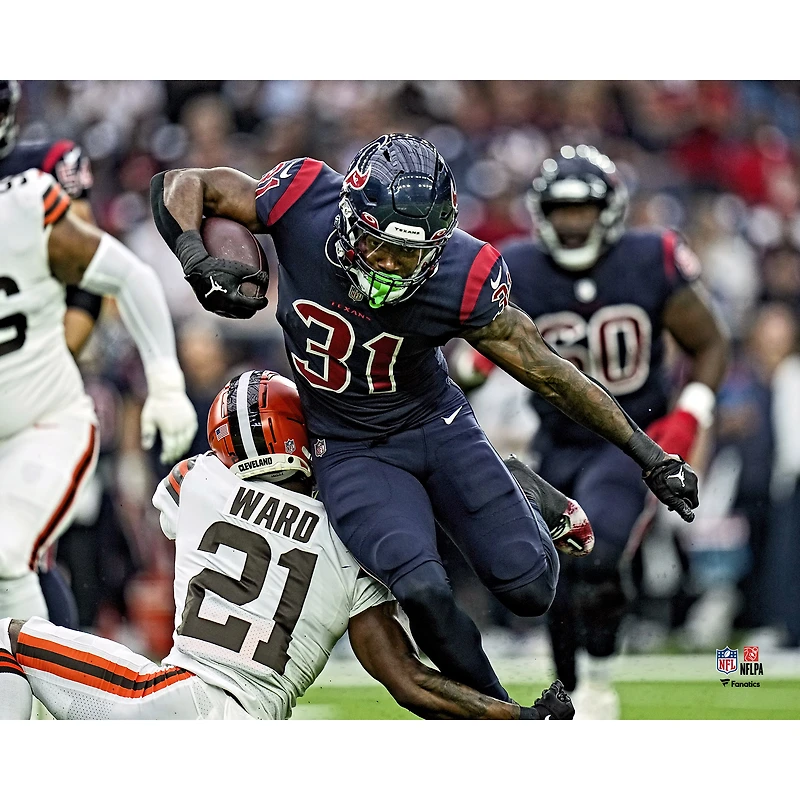 Dameon Pierce Houston Texans Unsigned Breaking a Tackle Photograph